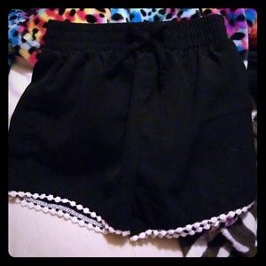 BLACK SHORTS WITH W/ WHITE FRINGE